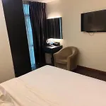 Capital O 91074 Grand World Hotel